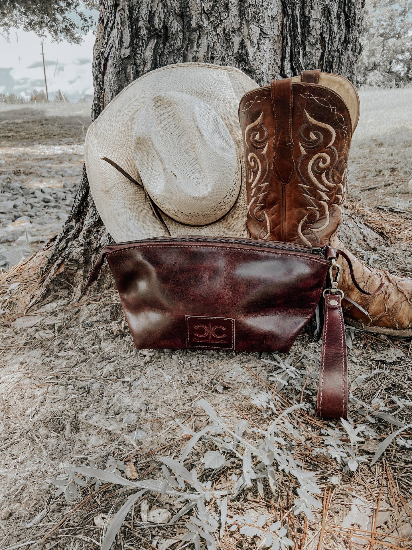 Tooled Leather Wristlet - Toiletry Bag